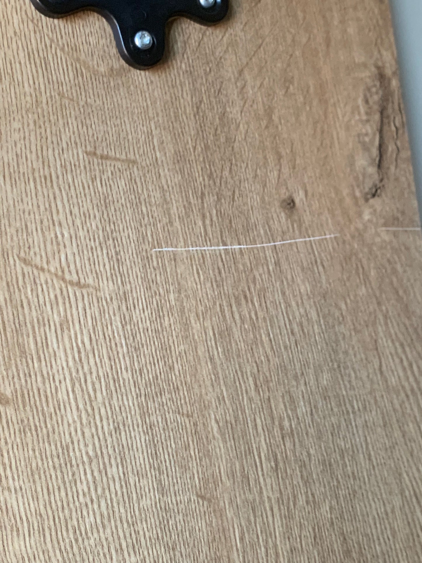 TableKarrier - Dents in the panel and scratch on the back side of the table